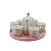 8-piece tea set displayed on a pink tray.