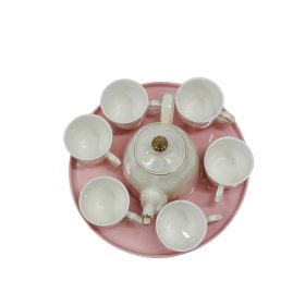 8-piece tea set displayed on a pink tray.