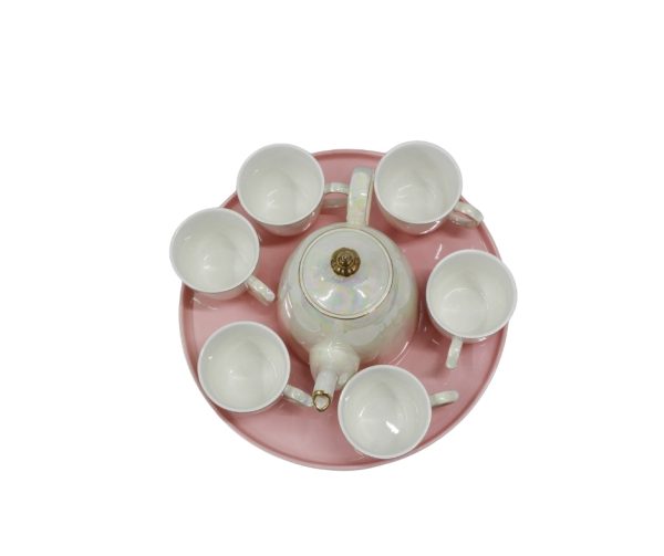 8-piece tea set displayed on a pink tray.
