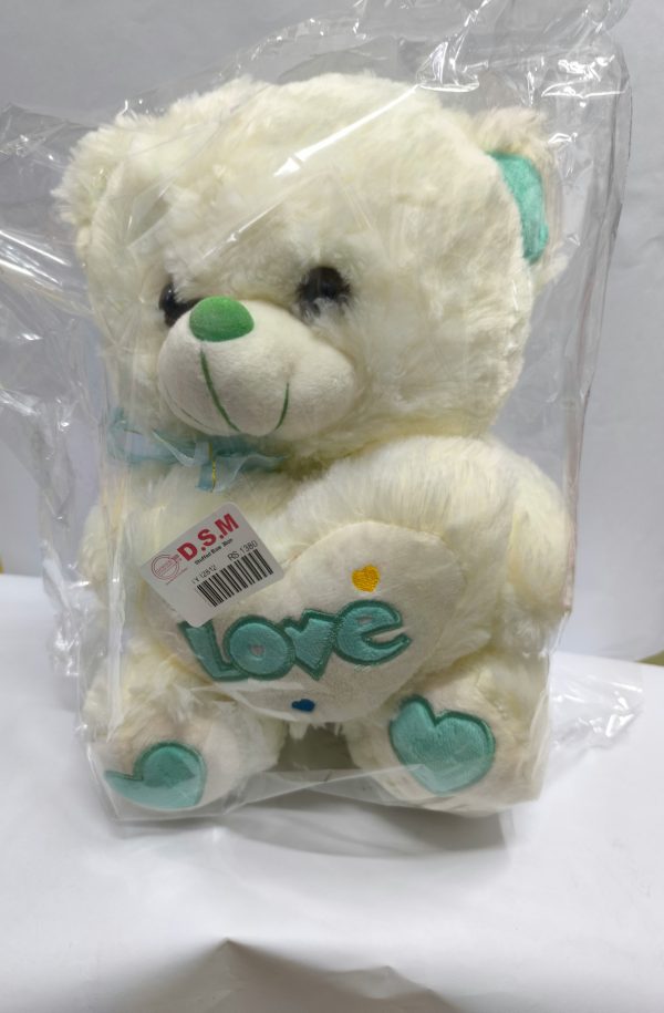 The heart pillow says "Love".