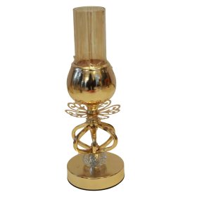 gold-colored candle holder